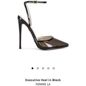 Black pointed toe pumps sold on revolve